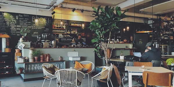 Cozy cafe with customers enjoying coffee and pastries