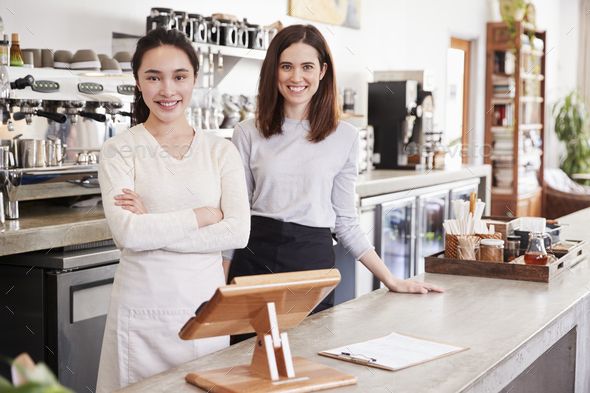 Local business owners celebrating growth from better online visibility