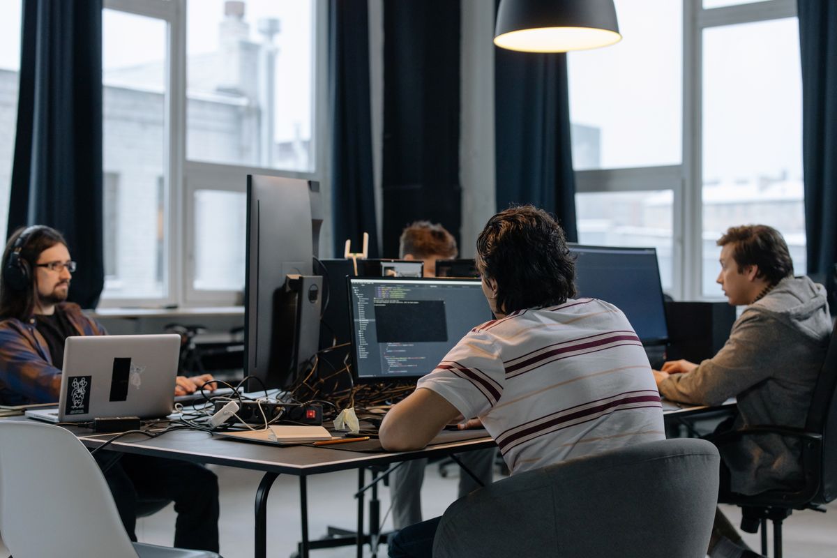 Startup development team collaborating on product and marketing strategy